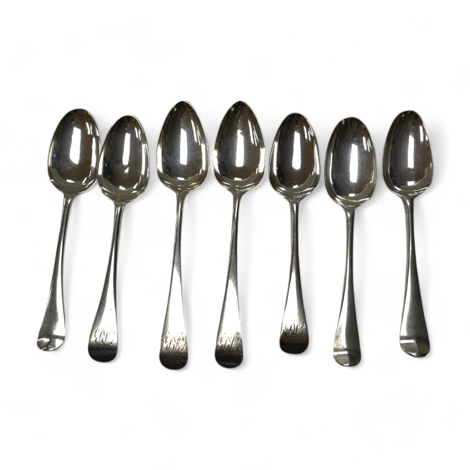 A pair of George III silver Old English pattern table spoons, Thomas Wallis II, London, 1798, 21.9cm and four earlier silver base mark table spoons, 14.3oz. Condition - poor to fair